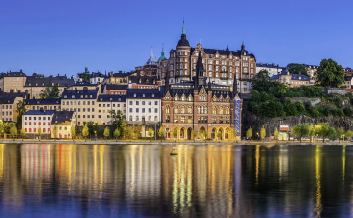 Stockholm dusk twilight illuminating Sodermalm tranquil waterfront Riddarfjarden panorama Sweden