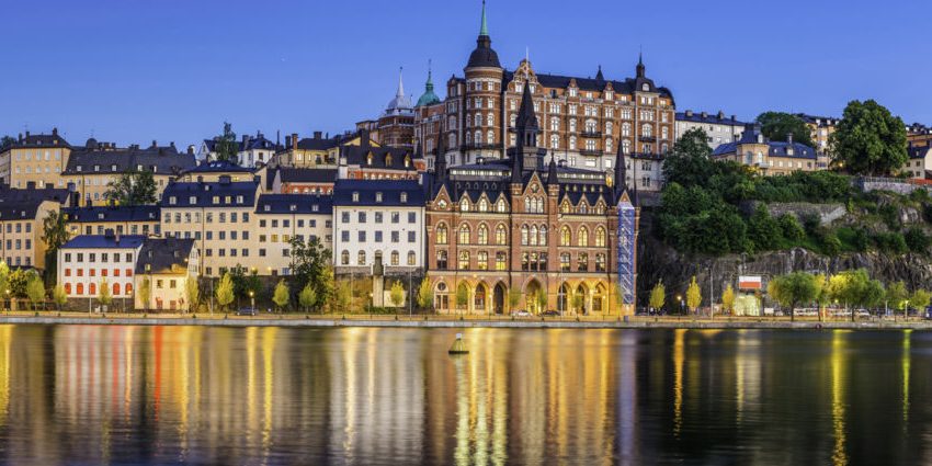 Stockholm dusk twilight illuminating Sodermalm tranquil waterfront Riddarfjarden panorama Sweden